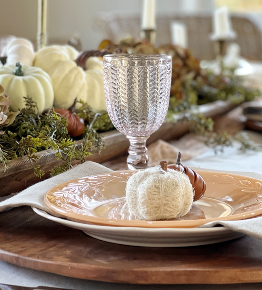 Use tinted impression glassware to add charm to any table setting. This fall table setting just got a lot more sparkle and whimsy. Find the details on the blog. 