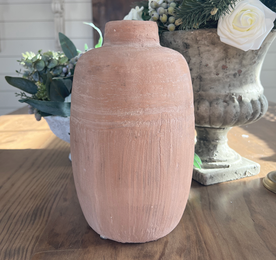 Terracotta colored pottery with rough texture. DIY vintage pottery